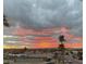 Striking sunset view over the city from the property, showcasing vibrant colors and urban scenery at 1401 E Puget Ave # 10, Phoenix, AZ 85020