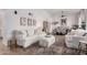 Bright living room with comfortable seating, stylish décor, and an open layout at 15806 N 45Th Pl, Phoenix, AZ 85032