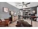 Well-organized office features ample shelving, a desk area, and stylish decor accents at 15806 N 45Th Pl, Phoenix, AZ 85032
