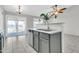 Kitchen with a stainless steel sink, dishwasher, and view of the backyard at 1858 S Ocotillo Dr, Apache Junction, AZ 85120