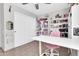 Bright office features light gray walls, tiled floors, and built in shelving at 1858 S Ocotillo Dr, Apache Junction, AZ 85120