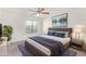 Serene bedroom with a comfortable bed, stylish decor, and soft natural light from the window at 1905 E University Dr # 139, Tempe, AZ 85288