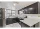 Modern kitchen with sleek cabinets, stainless steel appliances, and plenty of countertop space for cooking at 1905 E University Dr # 139, Tempe, AZ 85288