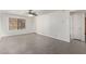 Bright, open living room featuring neutral decor, modern flooring, and a view of the entryway at 1905 E University Dr # 139, Tempe, AZ 85288
