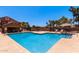 Community pool with lounge chairs, shaded seating, and a spa for relaxation and enjoyment at 1905 E University Dr # 139, Tempe, AZ 85288