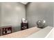 Stylish bar area with granite countertops and dark gray painted walls at 19415 W Colter St, Litchfield Park, AZ 85340