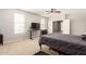 Comfortable bedroom featuring a ceiling fan, windows, and bed at 19415 W Colter St, Litchfield Park, AZ 85340