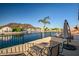 Balcony with scenic views of the lake, nearby houses, and mountains at 20657 N 56Th Ave, Glendale, AZ 85308