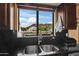 A kitchen window with a view of the waterway and mountain beyond at 20657 N 56Th Ave, Glendale, AZ 85308
