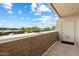 Balcony with views of the complex, concrete floor, and stucco walls at 2134 E Broadway Rd # 2031, Tempe, AZ 85282