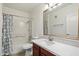 Bathroom featuring a vanity, a mirror, a toilet and a tub-shower combo with patterned shower curtain at 2134 E Broadway Rd # 2031, Tempe, AZ 85282