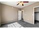 Bedroom with neutral walls, carpet, white door and trim, and closet at 2134 E Broadway Rd # 2031, Tempe, AZ 85282