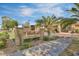 Inviting Villa Real Condominium Homes sign with lush landscaping and clear blue sky at 2134 E Broadway Rd # 2031, Tempe, AZ 85282
