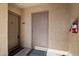 Condo entrance featuring secure door and visible unit number at 2134 E Broadway Rd # 2031, Tempe, AZ 85282