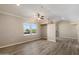 Bright, open living room with ceiling fan, modern flooring, and ample natural light at 2134 E Broadway Rd # 2031, Tempe, AZ 85282