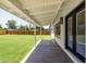 Inviting covered back porch offering a relaxing outdoor space with access to a large backyard at 215 W Ruth Ave, Phoenix, AZ 85021