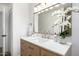 Bright bathroom featuring a modern vanity with sleek countertops and contemporary fixtures at 215 W Ruth Ave, Phoenix, AZ 85021