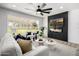Bright open living room with a large window, modern decor, and backyard view at 215 W Ruth Ave, Phoenix, AZ 85021