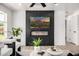 Interior shot showcasing modern entertainment area with TV and fireplace, plus modern design at 215 W Ruth Ave, Phoenix, AZ 85021