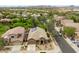Overhead view of a desert home neighborhood featuring desert landscaping, and solar panels, and multi car driveways at 2221 W Calle De Las Estrella Way, Phoenix, AZ 85085