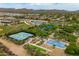 Breathtaking view showcasing tennis courts, a school, and abundant desert landscape at 2221 W Calle De Las Estrella Way, Phoenix, AZ 85085