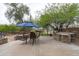 Backyard featuring patio furniture and a built-in BBQ, offering an ideal space for outdoor enjoyment at 2221 W Calle De Las Estrella Way, Phoenix, AZ 85085