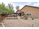 Well-kept backyard featuring a built-in BBQ and patio furniture, perfect for outdoor gatherings at 2221 W Calle De Las Estrella Way, Phoenix, AZ 85085