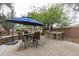Backyard featuring patio furniture and a built-in BBQ, perfect for enjoying outdoor meals and relaxation at 2221 W Calle De Las Estrella Way, Phoenix, AZ 85085