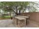 Backyard featuring a built-in BBQ with seating at 2221 W Calle De Las Estrella Way, Phoenix, AZ 85085