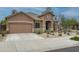 Beautiful single-story home showcases a well-maintained lawn and a classic facade at 2221 W Calle De Las Estrella Way, Phoenix, AZ 85085