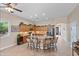 Bright, open kitchen featuring an island, granite countertops, and stainless steel appliances at 2221 W Calle De Las Estrella Way, Phoenix, AZ 85085