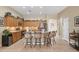 Spacious kitchen featuring an island with granite countertops and seating for four at 2221 W Calle De Las Estrella Way, Phoenix, AZ 85085