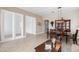Spacious living area offering wood floors, neutral paint, and an abundance of natural light at 2221 W Calle De Las Estrella Way, Phoenix, AZ 85085