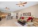 The house has an open living room and kitchen, and plenty of space for entertaining at 2221 W Calle De Las Estrella Way, Phoenix, AZ 85085