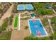 Overhead shot of tennis and basketball courts, complimented by a volleyball court and picnic area at 2221 W Calle De Las Estrella Way, Phoenix, AZ 85085