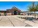 Stunning community clubhouse with an open-air design and modern architectural elements at 22476 E Indiana Ave, Queen Creek, AZ 85142