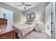Comfortable bedroom with a cozy bed and soft lighting at 2324 E Saguaro Park Ln, Phoenix, AZ 85024