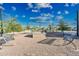 Community area featuring a barbecue grill, fire pit, benches and decorative lighting at 2324 E Saguaro Park Ln, Phoenix, AZ 85024