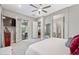 Spacious main bedroom with an ensuite bathroom and access to an outdoor patio at 2324 E Saguaro Park Ln, Phoenix, AZ 85024