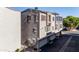 Aerial view of townhomes with parking garages, offering perspective on layout and architecture at 2401 E Rio Salado Pkwy # 1048, Tempe, AZ 85288