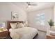 This cozy bedroom features a large window, neutral decor, and a comfortable bed, creating a serene retreat at 2401 E Rio Salado Pkwy # 1048, Tempe, AZ 85288