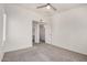 Bedroom features a ceiling fan, carpeted floor, neutral paint, and access to the bathroom at 2401 E Rio Salado Pkwy # 1048, Tempe, AZ 85288