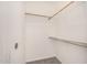 Walk-in closet features carpet flooring, neutral paint, and built-in shelving at 2401 E Rio Salado Pkwy # 1048, Tempe, AZ 85288