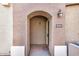 Inviting entryway featuring a welcoming door with an arched entryway and a stylish light fixture at 2401 E Rio Salado Pkwy # 1048, Tempe, AZ 85288