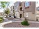 Attractive townhome complex featuring well-maintained landscaping and charming architectural details at 2401 E Rio Salado Pkwy # 1048, Tempe, AZ 85288