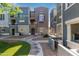 View of townhome exteriors with landscaped walkways, various color schemes and charming architectural details at 2401 E Rio Salado Pkwy # 1048, Tempe, AZ 85288