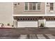 The community has garages with unit number labels and parking in front at 2401 E Rio Salado Pkwy # 1048, Tempe, AZ 85288