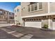 The community has garages with unit number labels and visitor parking in front at 2401 E Rio Salado Pkwy # 1048, Tempe, AZ 85288