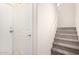Hallway with neutral paint and carpeted stairs at 2401 E Rio Salado Pkwy # 1048, Tempe, AZ 85288