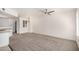 Spacious living area with ceiling fan, carpet and natural light at 2401 E Rio Salado Pkwy # 1048, Tempe, AZ 85288